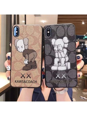 KAWS コーチ コラボ iphone 14/13 mini/14 pro/14 pro maxケース ブランド ペアお揃い ジャケット型 カウズ モノグラム 人気 アイフォン14/14プロ/13ミニケース おまけつき メンズ レディース