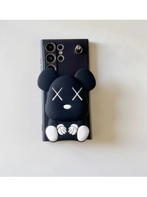 kaws ブランド galaxy s23/s23 plus/s23 ultraケース カウズ 韓国風 熊柄 モノグラム  小銭入れ ストラップ付き 収納可能 TPU ジャケット型 スタンド機能 黒色 ギャラクシーs23/s23プラス/s23ウルトラ/s22/s21/s20/note20カバー 芸能人愛用 メンズ レディース