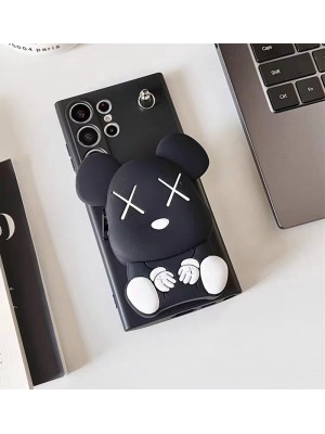 kaws ブランド galaxy s23/s23 plus/s23 ultraケース カウズ 韓国風 熊柄 モノグラム  小銭入れ ストラップ付き 収納可能 TPU ジャケット型 スタンド機能 黒色 ギャラクシーs23/s23プラス/s23ウルトラ/s22/s21/s20/note20カバー 芸能人愛用 メンズ レディース