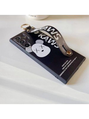 Kaws ブランド Galaxy S23/S23+/S23 Plus/S23 Ultraケース 熊柄 カウズ おしゃれ リング付き ジャケット型 ハンドバンド付き スタンド機能 モノグラム 韓国風 ギャラクシーs23/s23プラス/s23ウルトラ/s22/s21カバー 耐衝撃 ファッション メンズ レディーズ