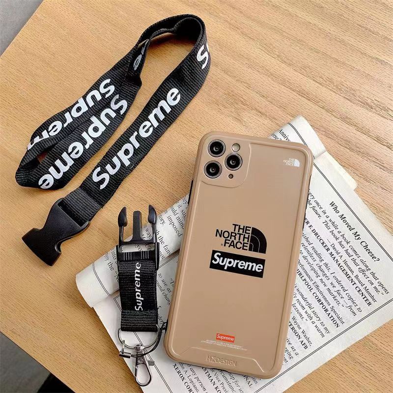 Supreme The North Face コラボ ブランド Iphone14Pro Max/14Pro14ケース 個性 シュプリーム ザノースフェイス ストラップ付き モノグラム ジャケット型 アイフォン14プロ マックス/14プロ/14カバー ファッション レディース